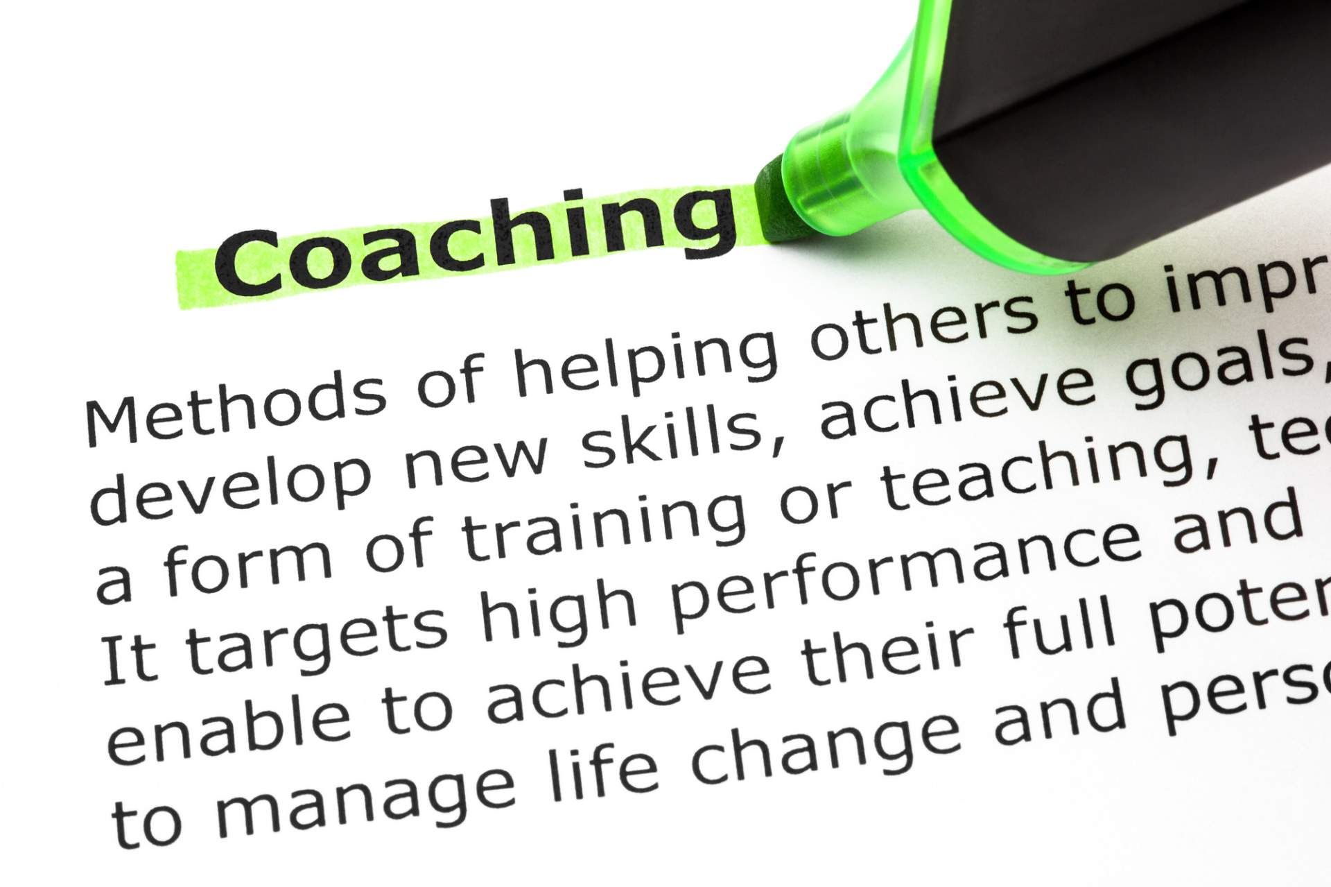 Coaching definition with the word, 'coaching' highlighted in green
